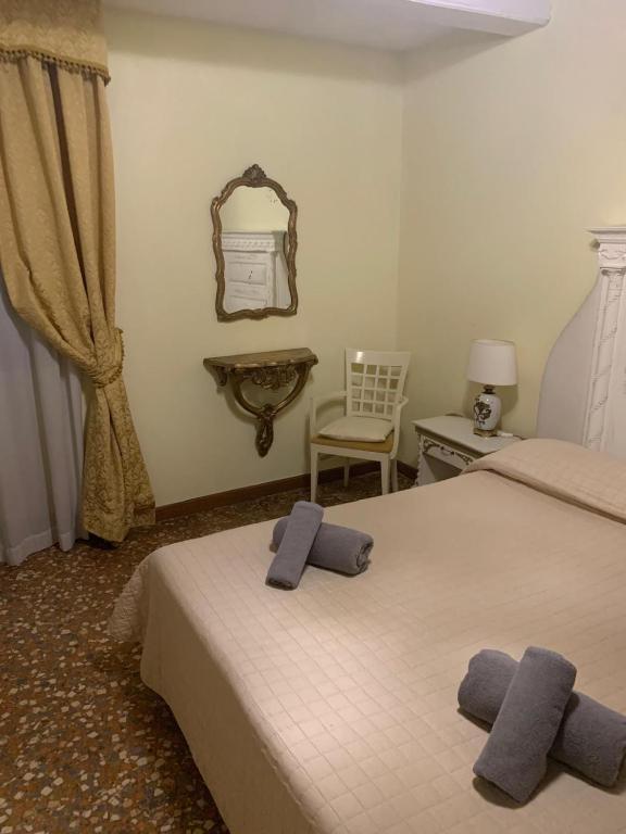 Posteľ alebo postele v izbe v ubytovaní B&B Luxury San Firmino Canal View