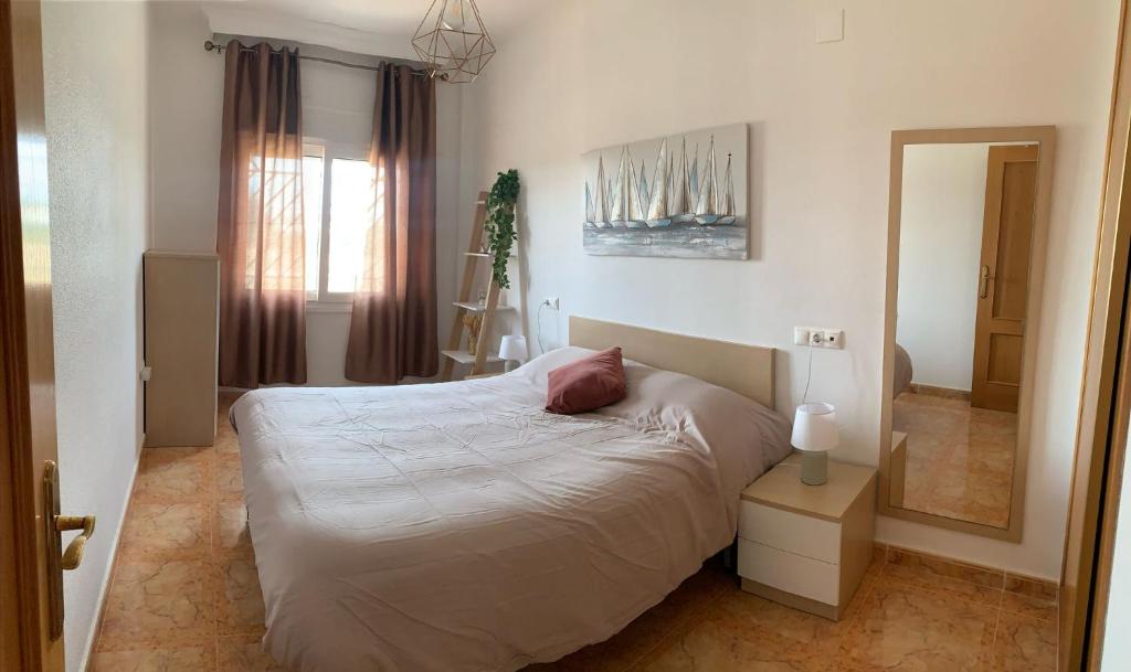 En eller flere senge i et værelse på Lodosol Raúl