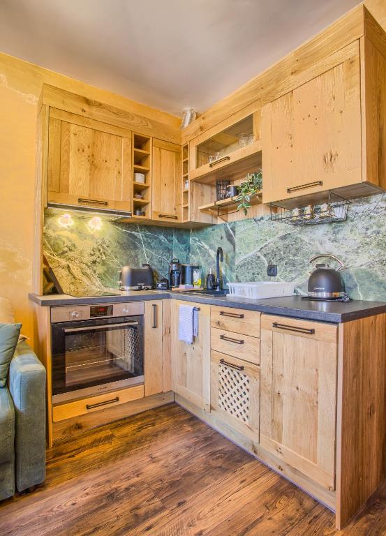 Kuchyň nebo kuchyňský kout v ubytování Fortuna Light Apartment