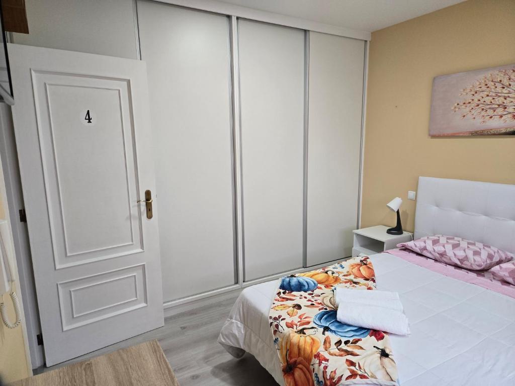 Postel nebo postele na pokoji v ubytování Guest House Pereira