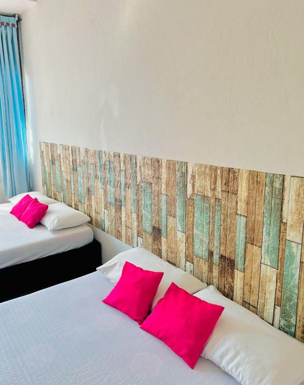 Postel nebo postele na pokoji v ubytování CasaGitanos Hotel