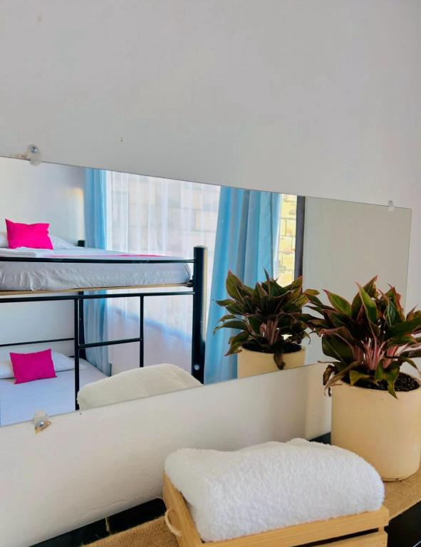 Postel nebo postele na pokoji v ubytování CasaGitanos Hotel