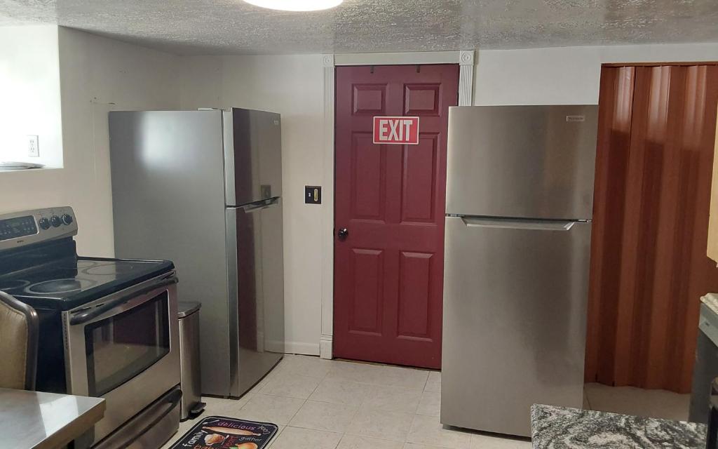 Kuchyň nebo kuchyňský kout v ubytování Mikes Place