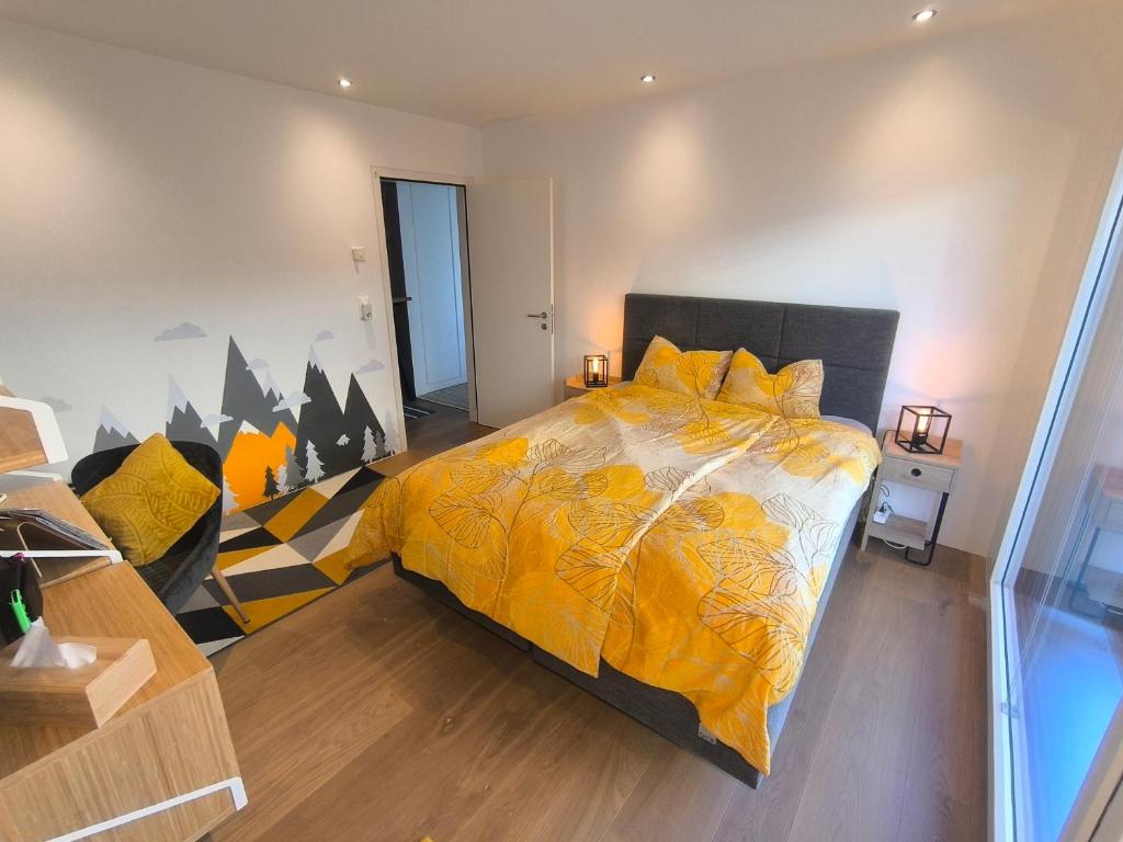 Ένα ή περισσότερα κρεβάτια σε δωμάτιο στο Studio en Gruyère - Grande terrasse privée 50m2 et Jaccuzi optionnel