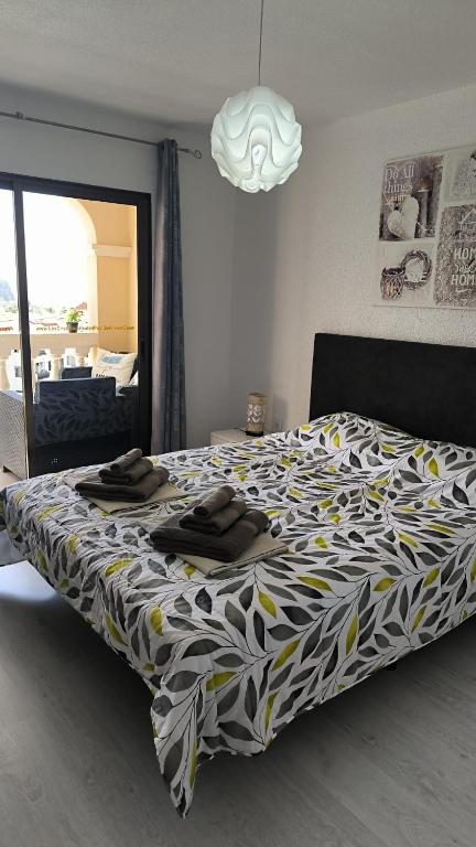 Кровать или кровати в номере Los Cristianos Heated Pool Sea View AC
