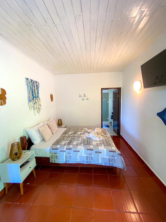 Postel nebo postele na pokoji v ubytování Patyco House- Morro de São Paulo