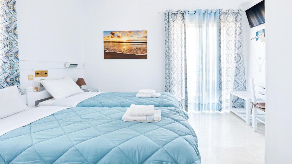 Postel nebo postele na pokoji v ubytování Melissani hotel