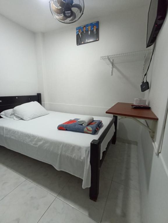 Postel nebo postele na pokoji v ubytování Hotel San Vicente