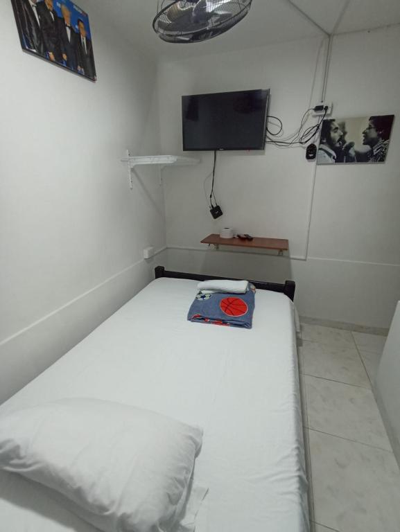 Postel nebo postele na pokoji v ubytování Hotel San Vicente