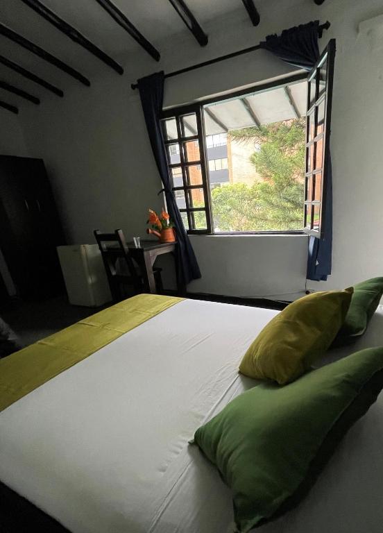 Postel nebo postele na pokoji v ubytování Hotel Premium Real