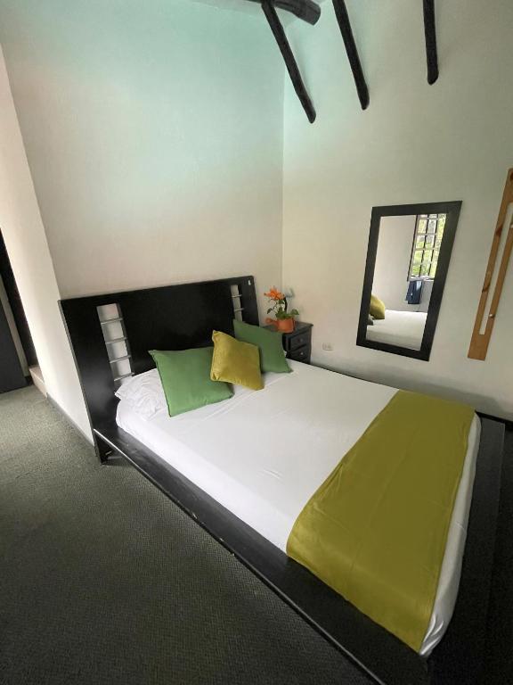 Postel nebo postele na pokoji v ubytování Hotel Premium Real