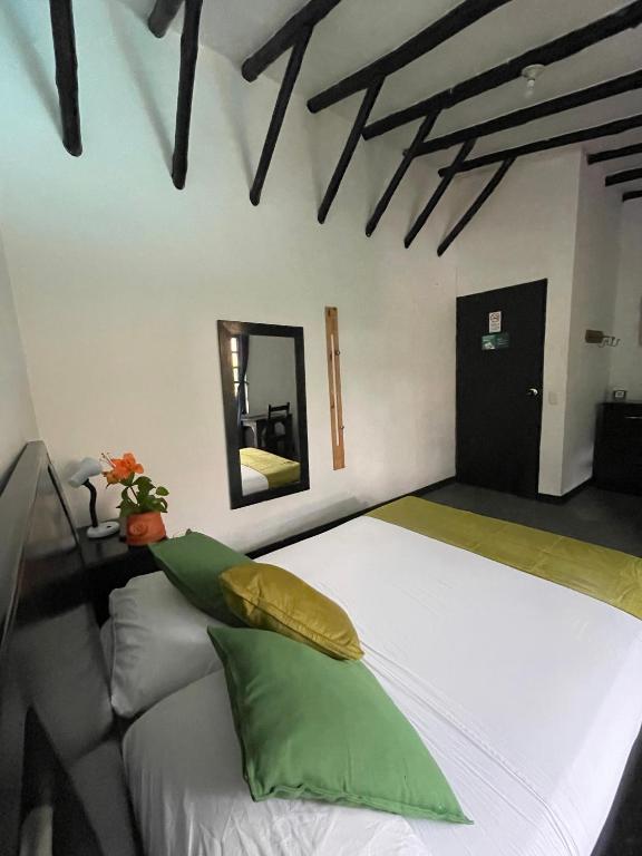 Postel nebo postele na pokoji v ubytování Hotel Premium Real