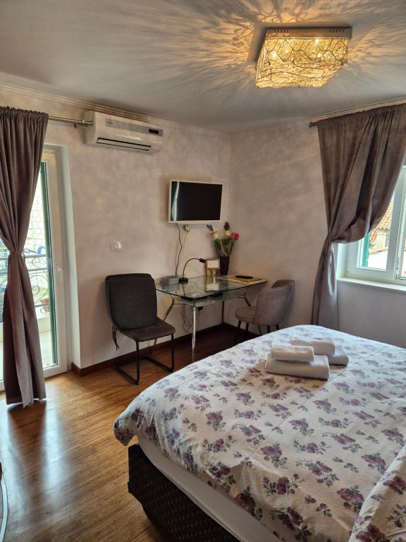 Posteľ alebo postele v izbe v ubytovaní ToMaDi Residence