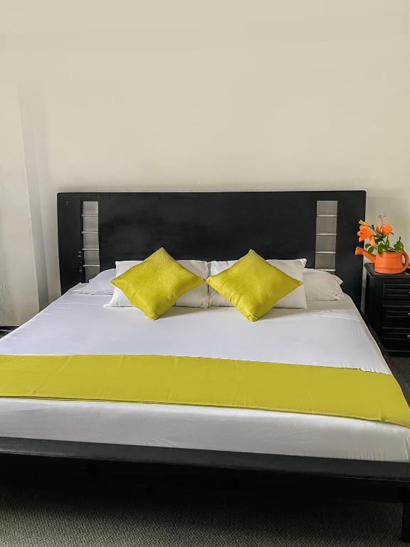 Postel nebo postele na pokoji v ubytování Hotel Premium Real