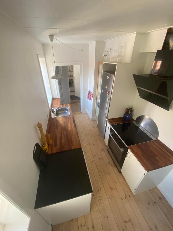 Kuchyň nebo kuchyňský kout v ubytování Cozy and Central