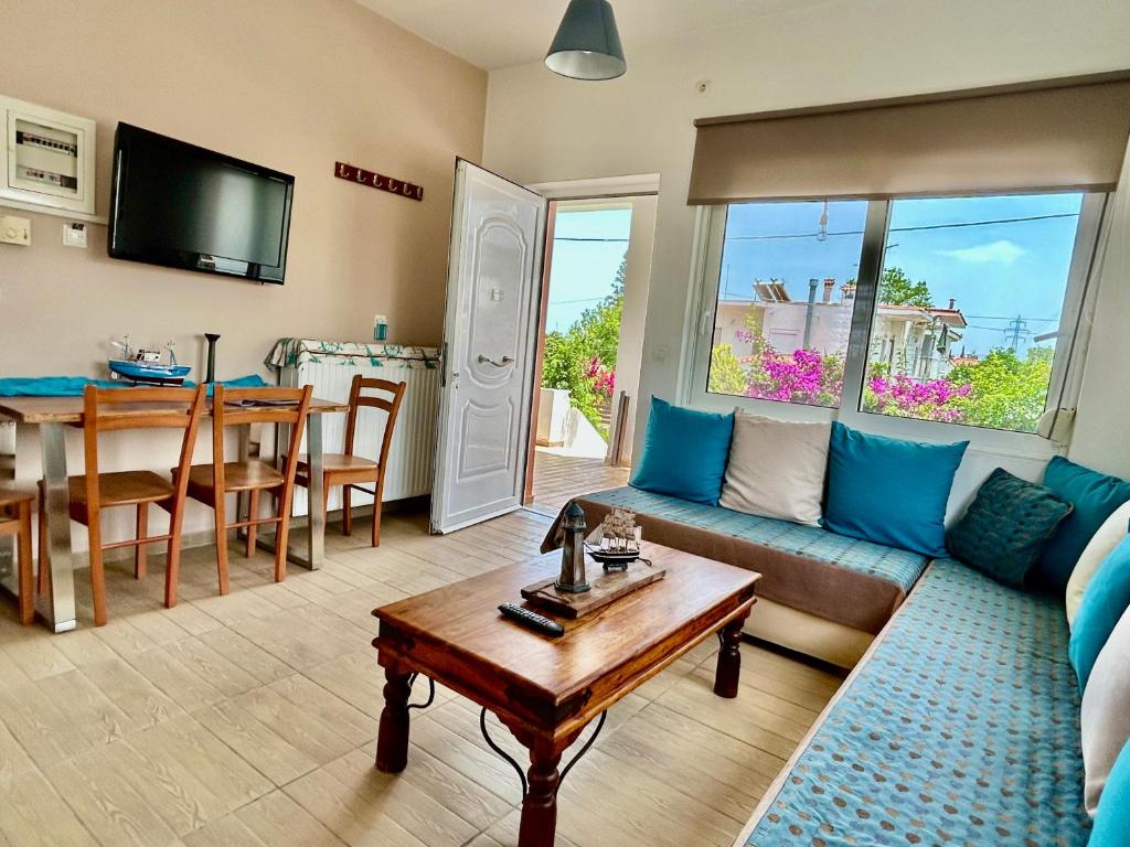 A television and/or entertainment centre at Michaella's Maissonete at Rafaella Resort
