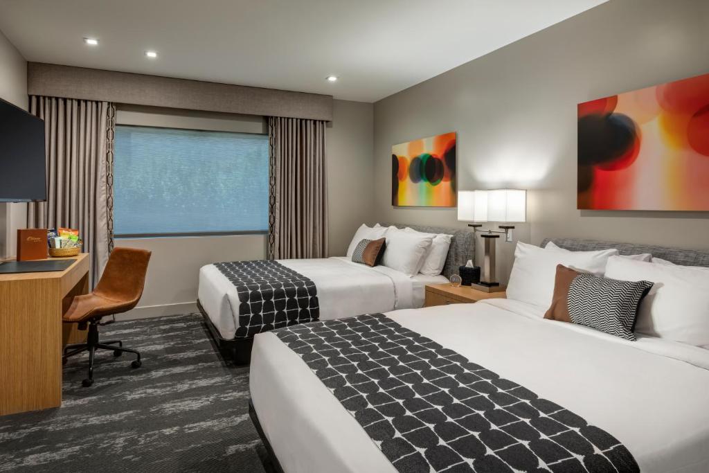 Postel nebo postele na pokoji v ubytování Olivia Hotel