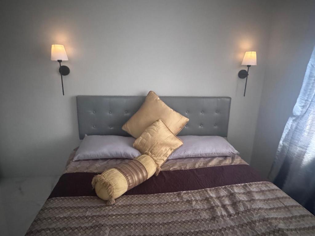Postel nebo postele na pokoji v ubytování Paradise Breeze