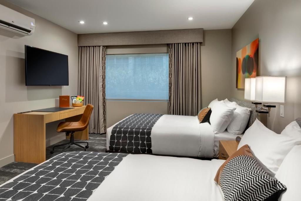 Postel nebo postele na pokoji v ubytování Olivia Hotel