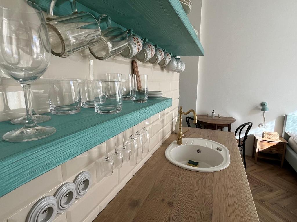 Kuchyň nebo kuchyňský kout v ubytování Apartmány Naxarův dvůr
