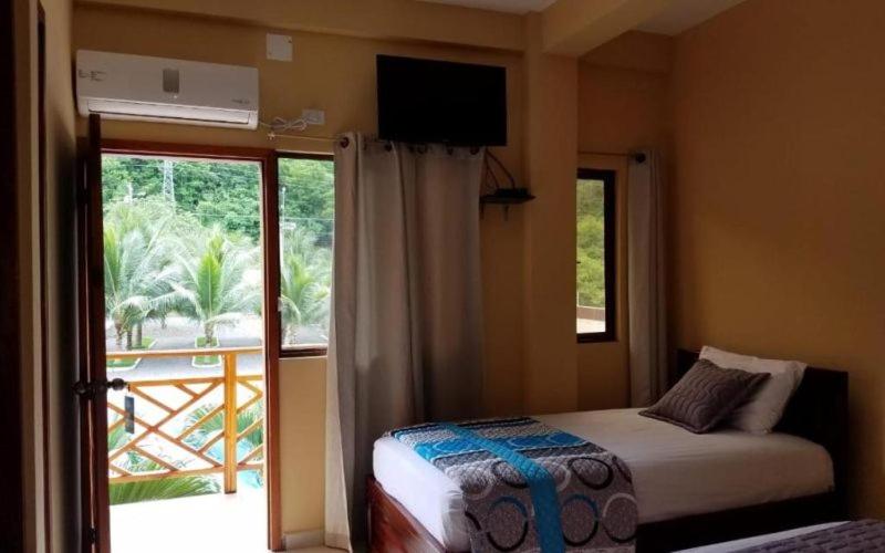 Postel nebo postele na pokoji v ubytování Hotel Soberao