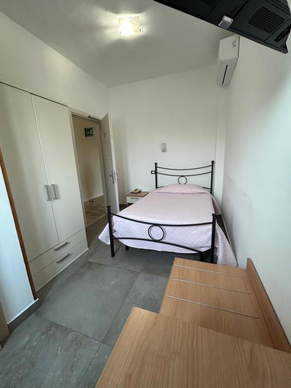 Postel nebo postele na pokoji v ubytování Hotel Marchina