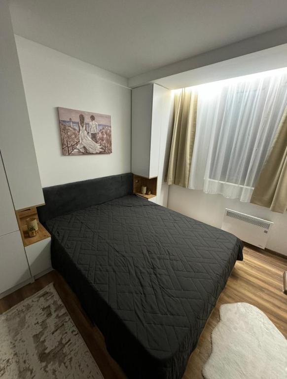 Postel nebo postele na pokoji v ubytování Royal Gold & Spa Kop