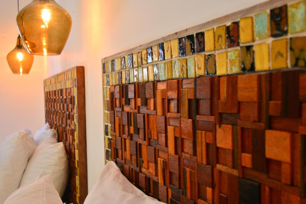 Postel nebo postele na pokoji v ubytování Unic Design Hotel & Restaurant- 5th Avenue