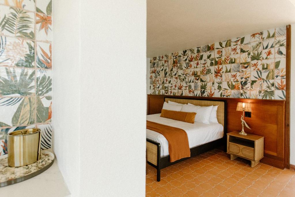 Postel nebo postele na pokoji v ubytování King Christian Hotel