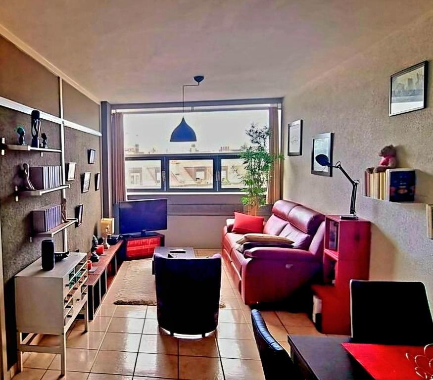 Posezení v ubytování Appartement très lumineux au centre ville