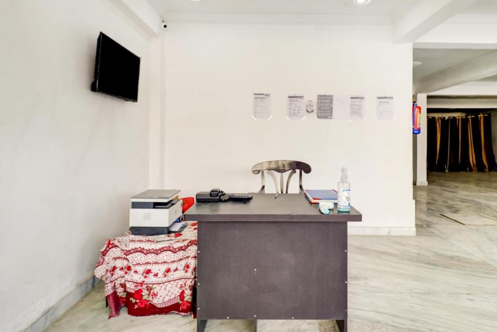 Kuchyň nebo kuchyňský kout v ubytování Hotel O BJ Residency