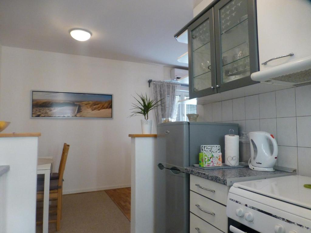 Kuchyň nebo kuchyňský kout v ubytování Apartment Emily