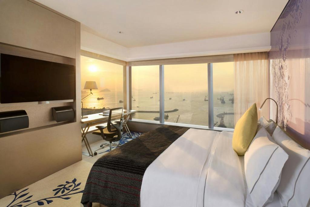 A bed or beds in a room at W Hong Kong