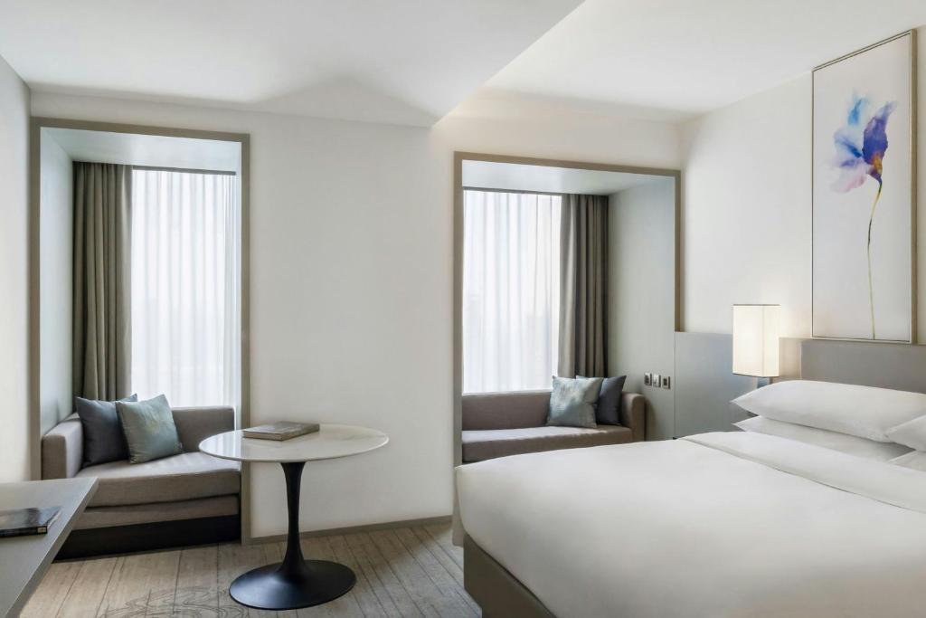 Postel nebo postele na pokoji v ubytování Courtyard by Marriott Taipei Downtown