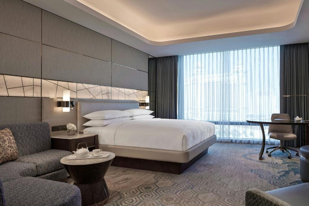 Postel nebo postele na pokoji v ubytování JW Marriott Hotel Macau