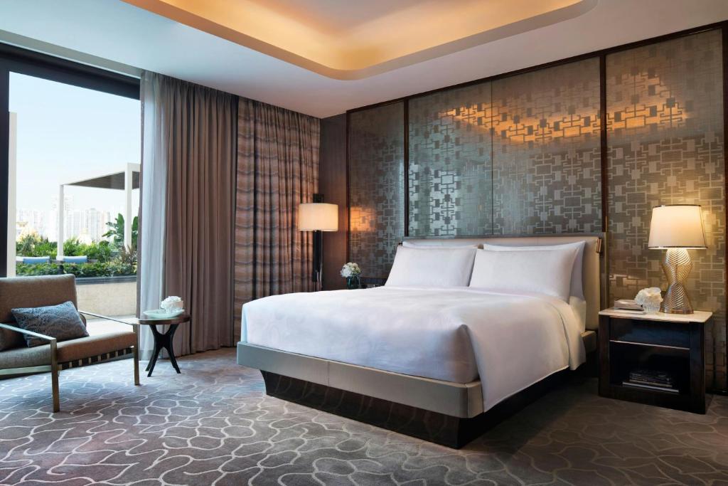 Postel nebo postele na pokoji v ubytování JW Marriott Hotel Macau