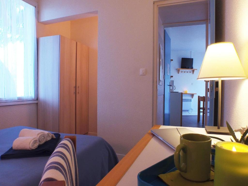 Postel nebo postele na pokoji v ubytování Ars-en-Ré - Apt