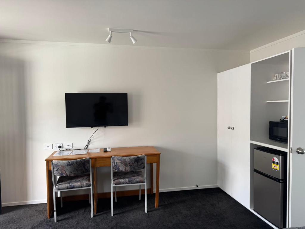 Kuchyň nebo kuchyňský kout v ubytování Grosvenor Motel