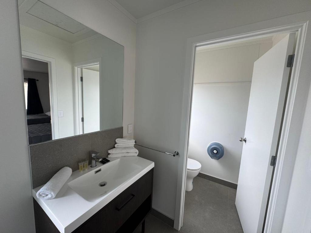 Koupelna v ubytování Grosvenor Motel