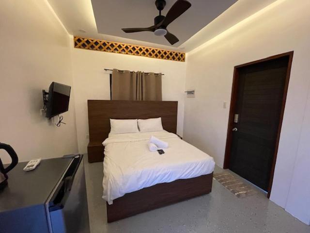 Postel nebo postele na pokoji v ubytování Lulinghayaw Resort-Panglao