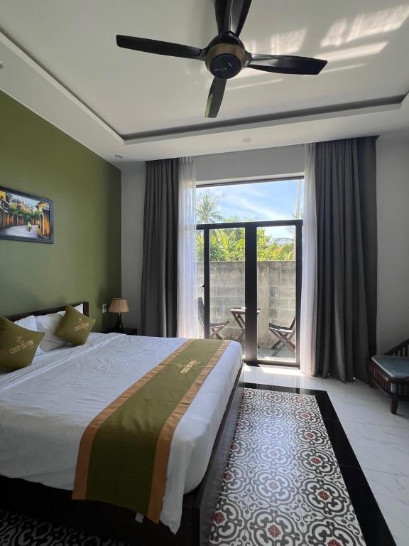 Postel nebo postele na pokoji v ubytování Coco Island Villa