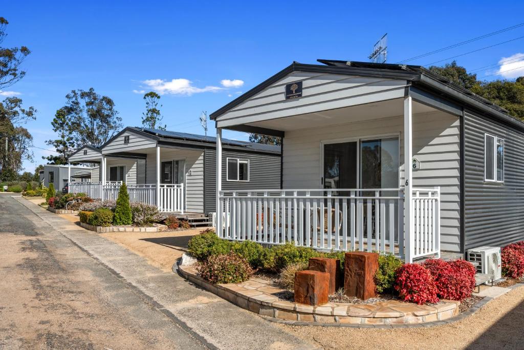 a row of modular homes on a street at Crows Nest Tourist Park in Crows Nest