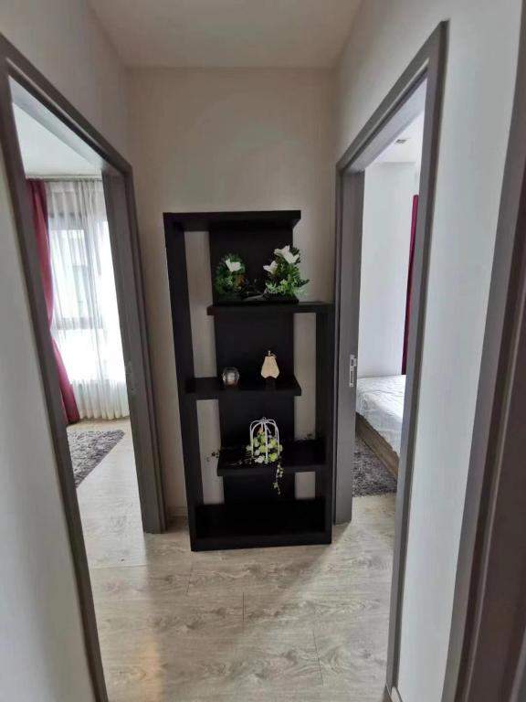 a hallway with two mirrors and a room at The Base海景网红顶层无边泳池 双卧室套房 in Pattaya Central