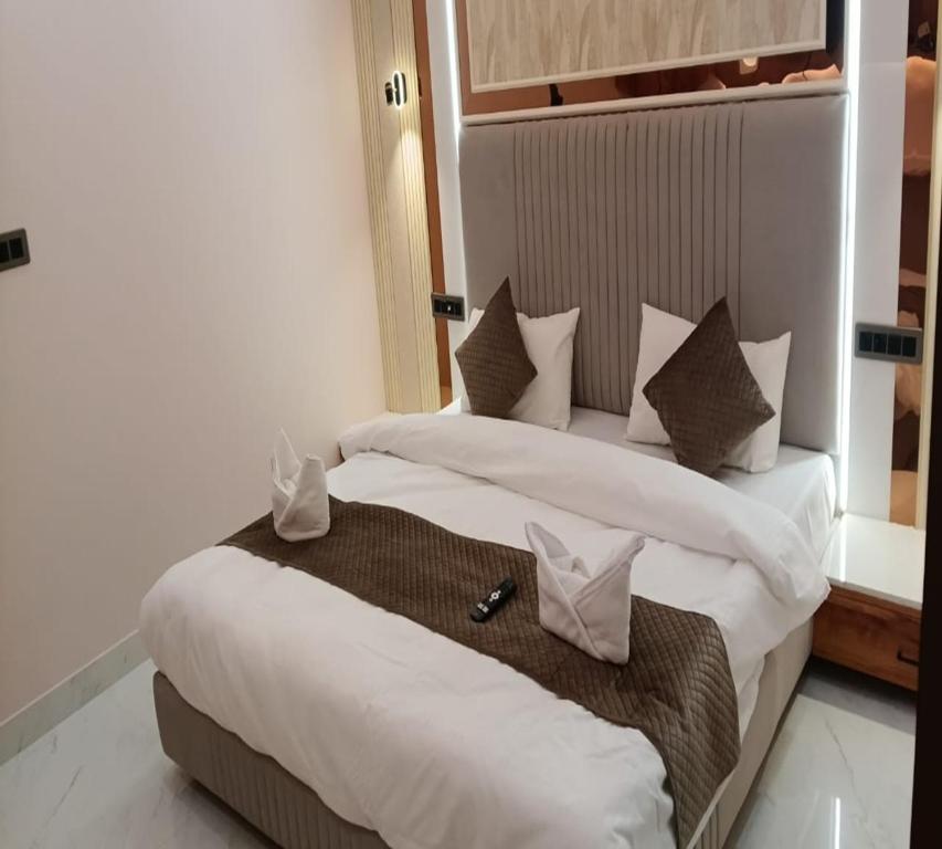 Postel nebo postele na pokoji v ubytování Hotel Spring Vilas