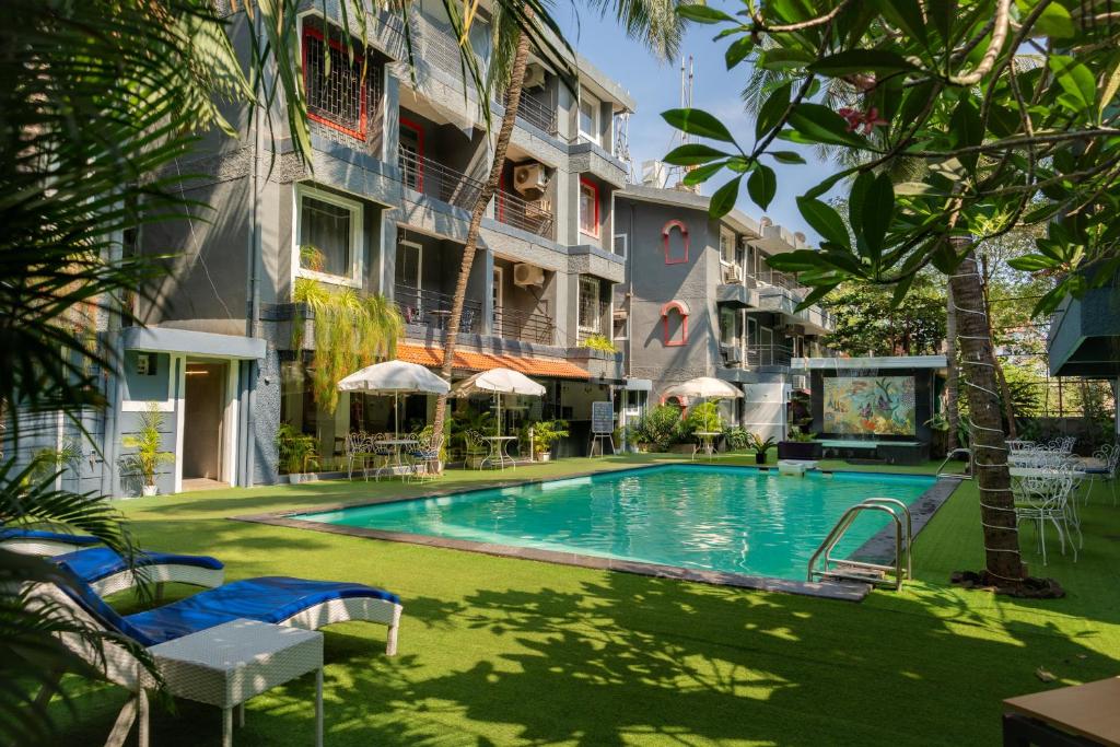 Bazén v ubytování Magnum Resorts- Near Candolim Beach, Goa nebo v jeho okolí