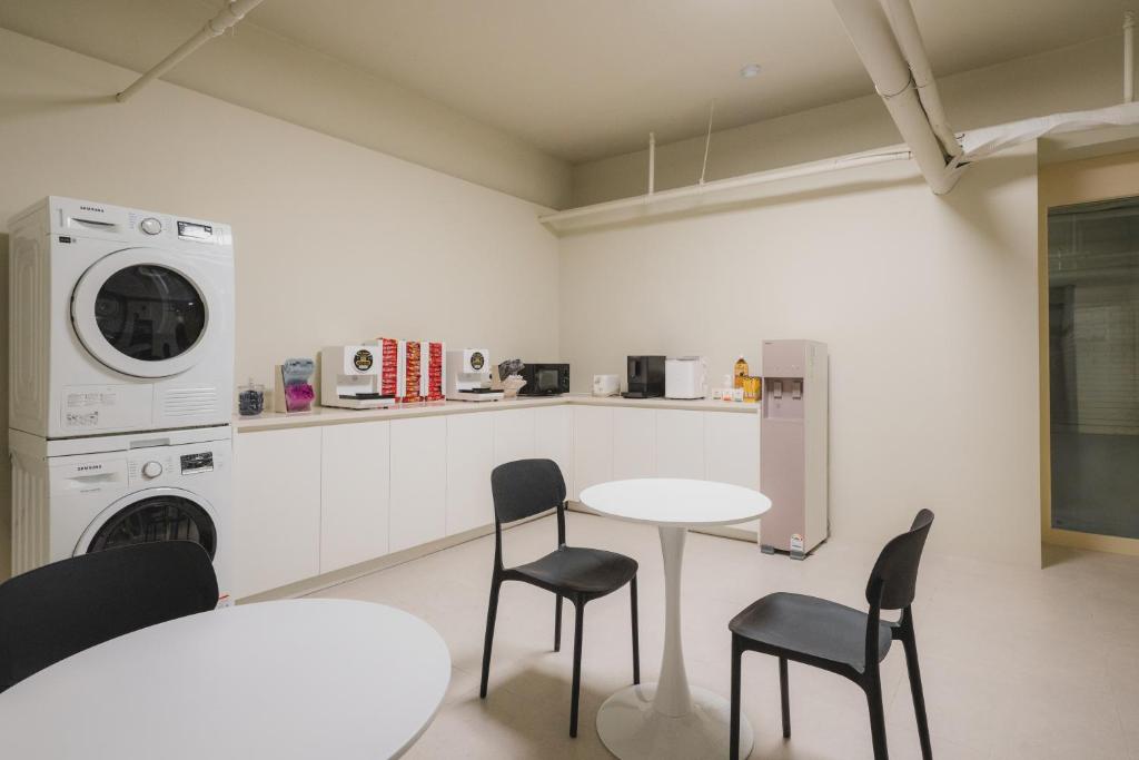 Kuchyň nebo kuchyňský kout v ubytování GOYU Hotel