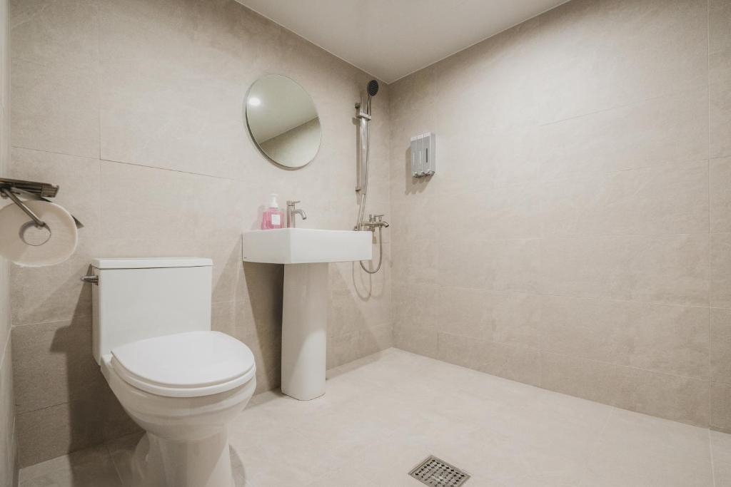 Koupelna v ubytování GOYU Hotel