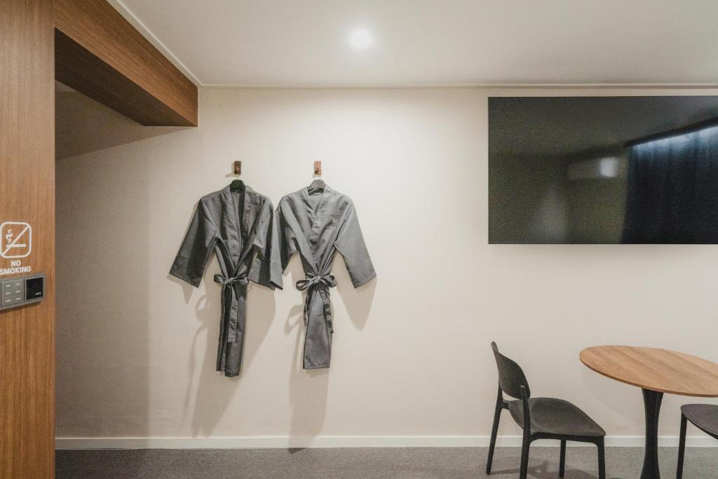 TV a/nebo společenská místnost v ubytování GOYU Hotel