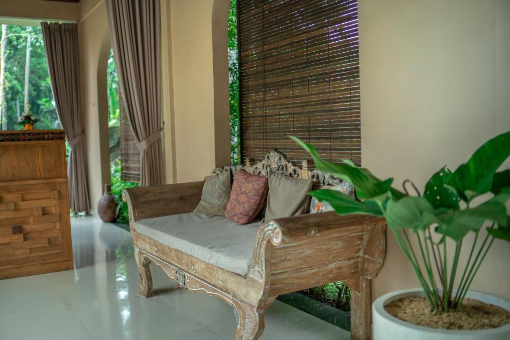 Posezení v ubytování Abhirama Villas and Spa