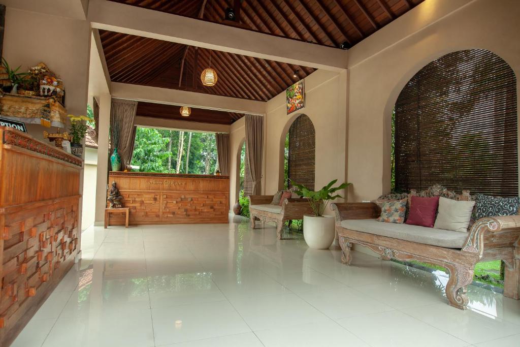 Posezení v ubytování Abhirama Villas and Spa